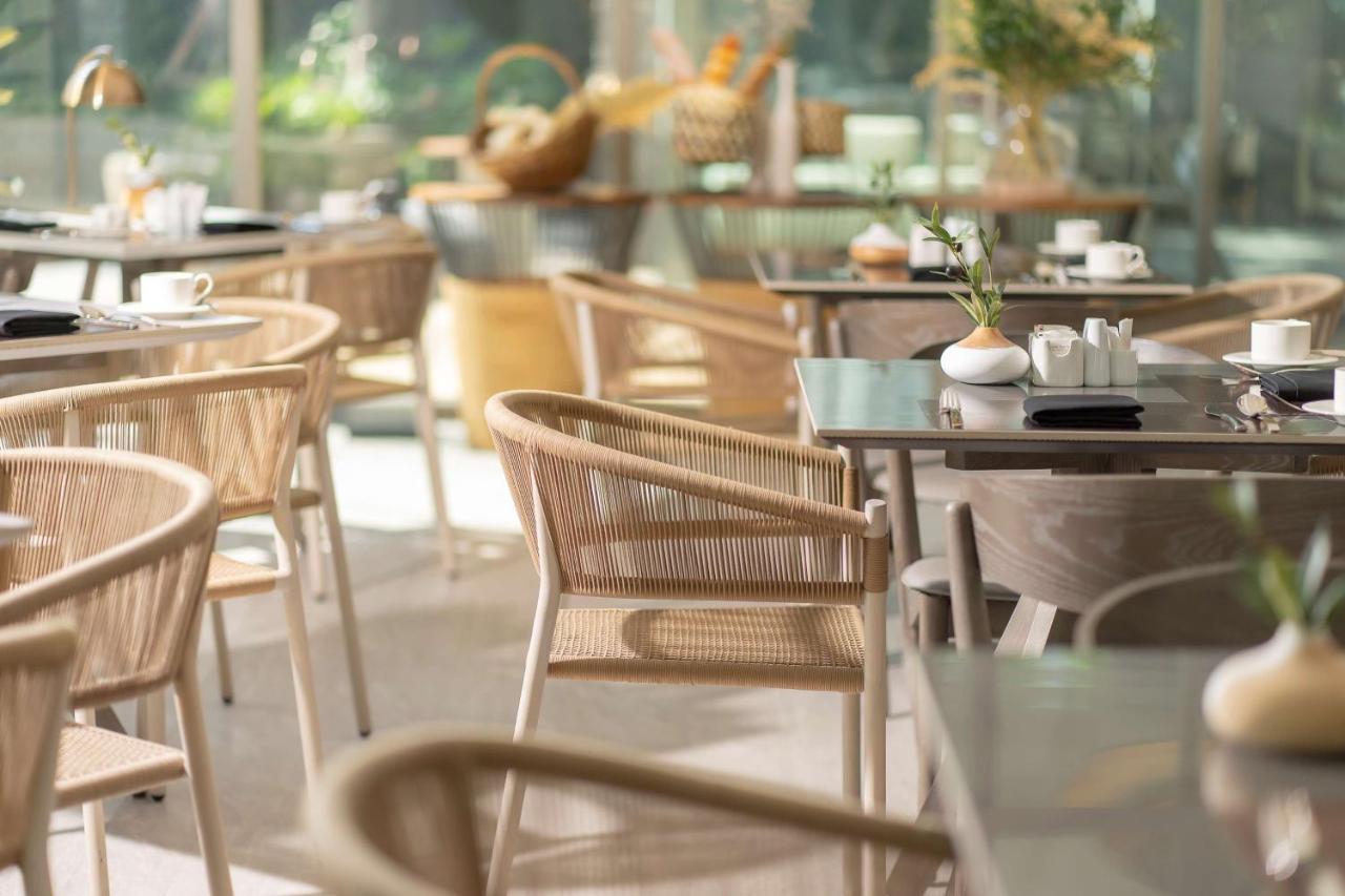 Bayphere Hotel Pattaya Jc 나 좀티엔 외부 사진 The interior of the restaurant