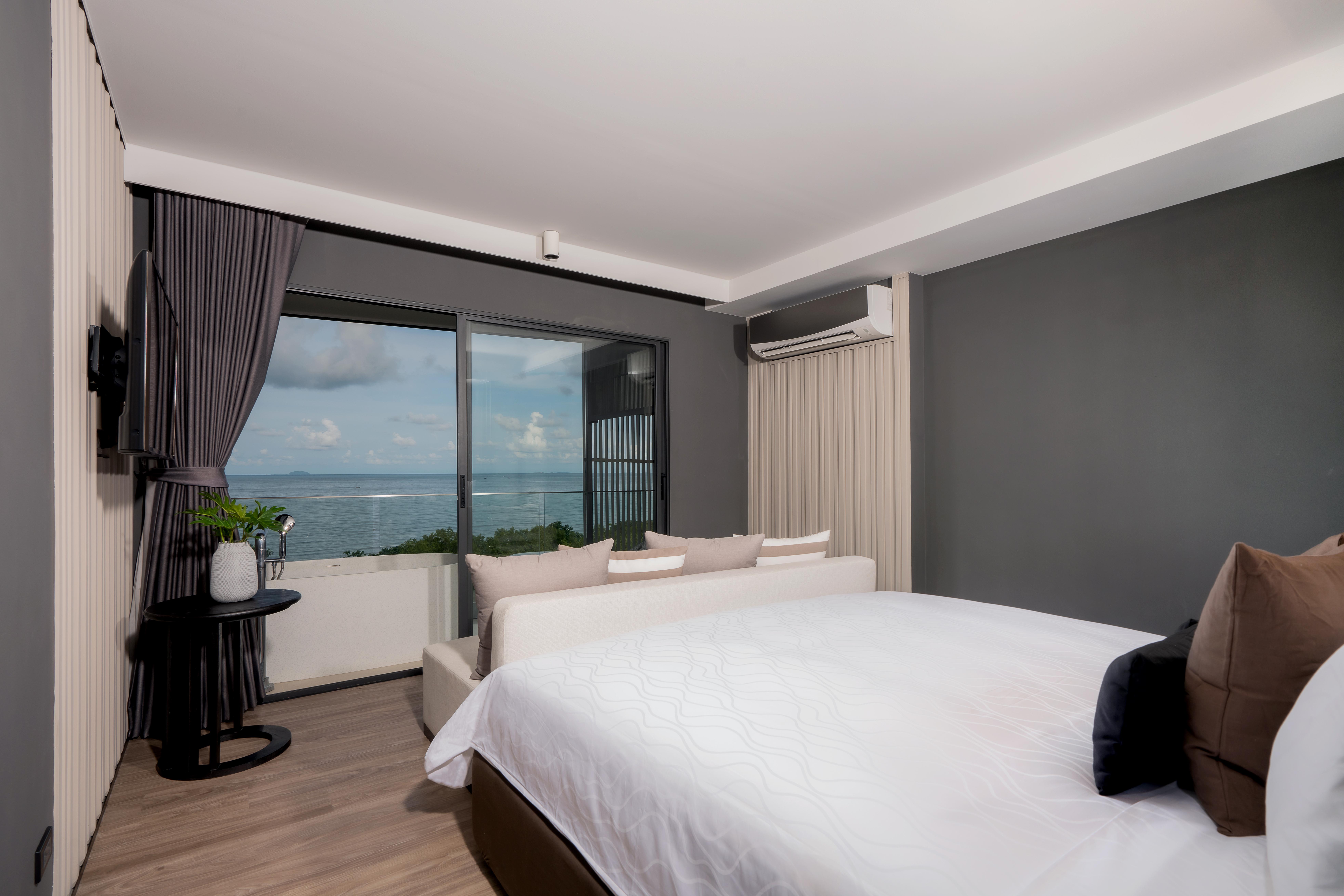 Bayphere Hotel Pattaya Jc 나 좀티엔 외부 사진 A bedroom in a hotel