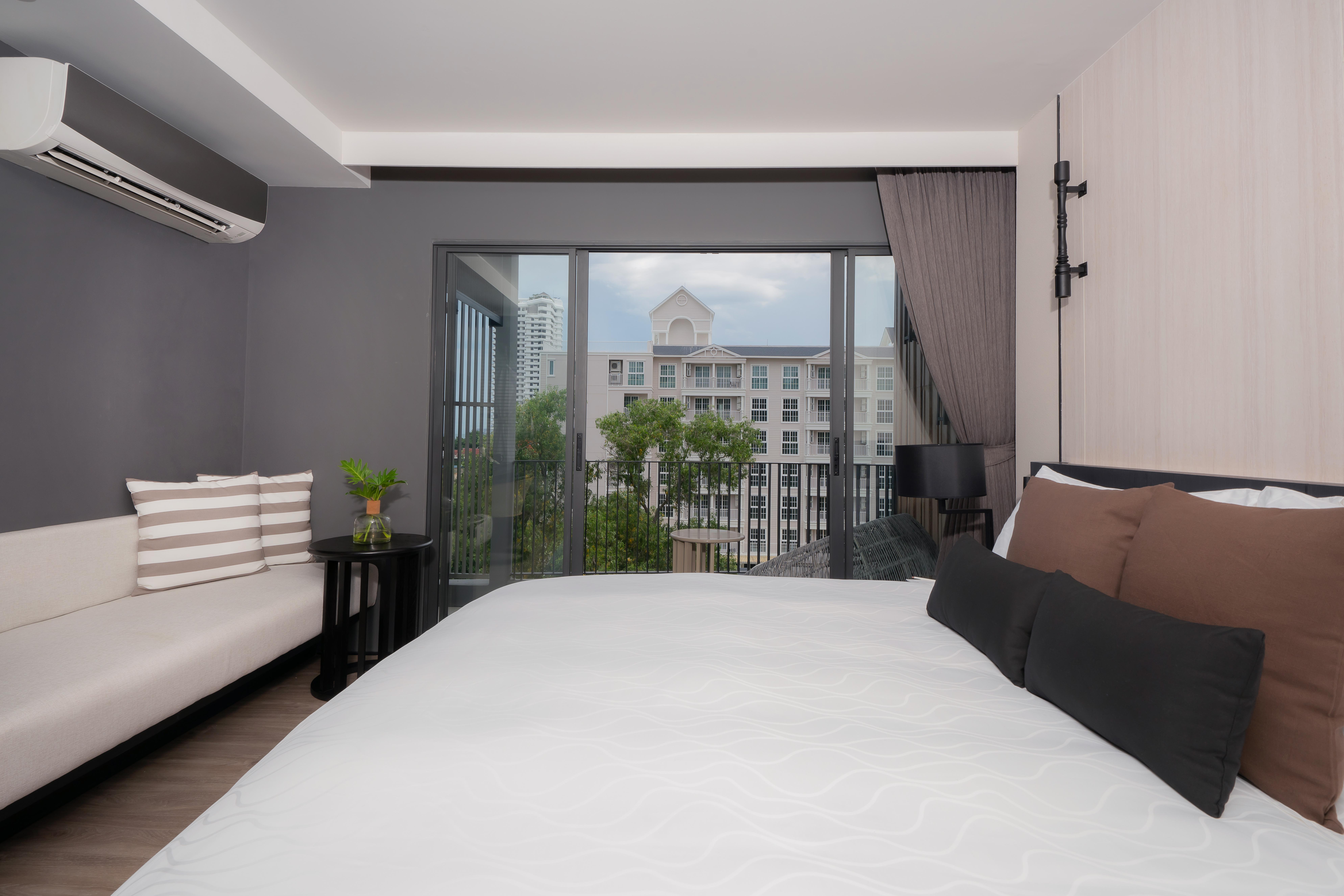 Bayphere Hotel Pattaya Jc 나 좀티엔 외부 사진 A bedroom at the hotel